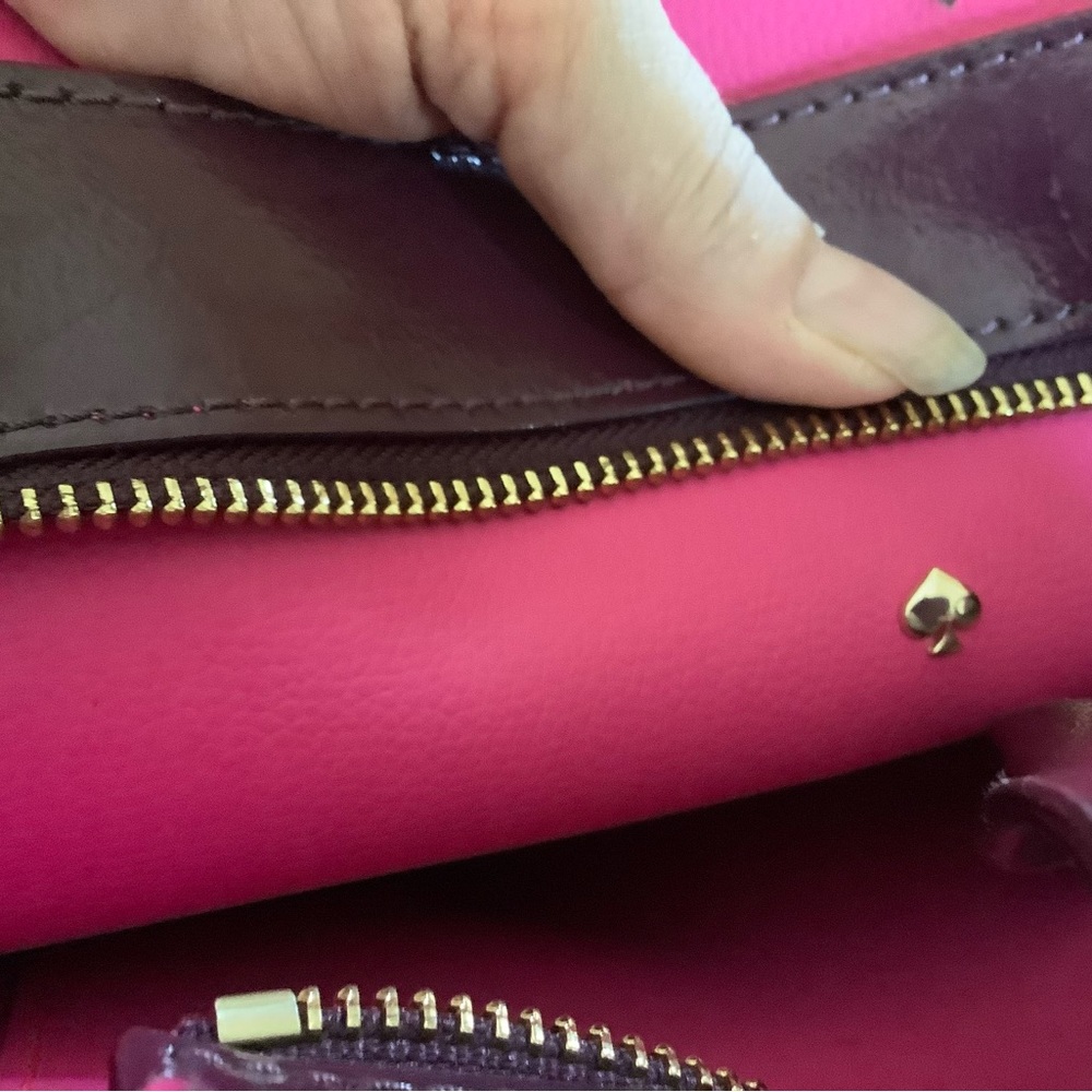 Kate Spade beautiful plum in a vinyl material . In pre owned condition. - Picture 6 of 7